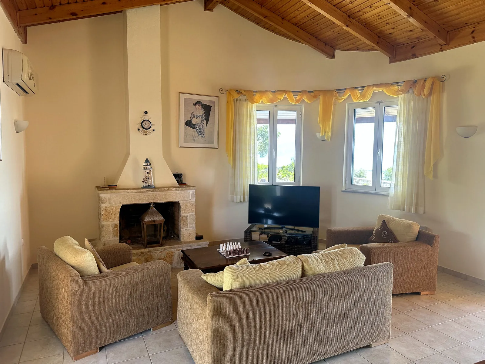 Living room with stone fireplace
