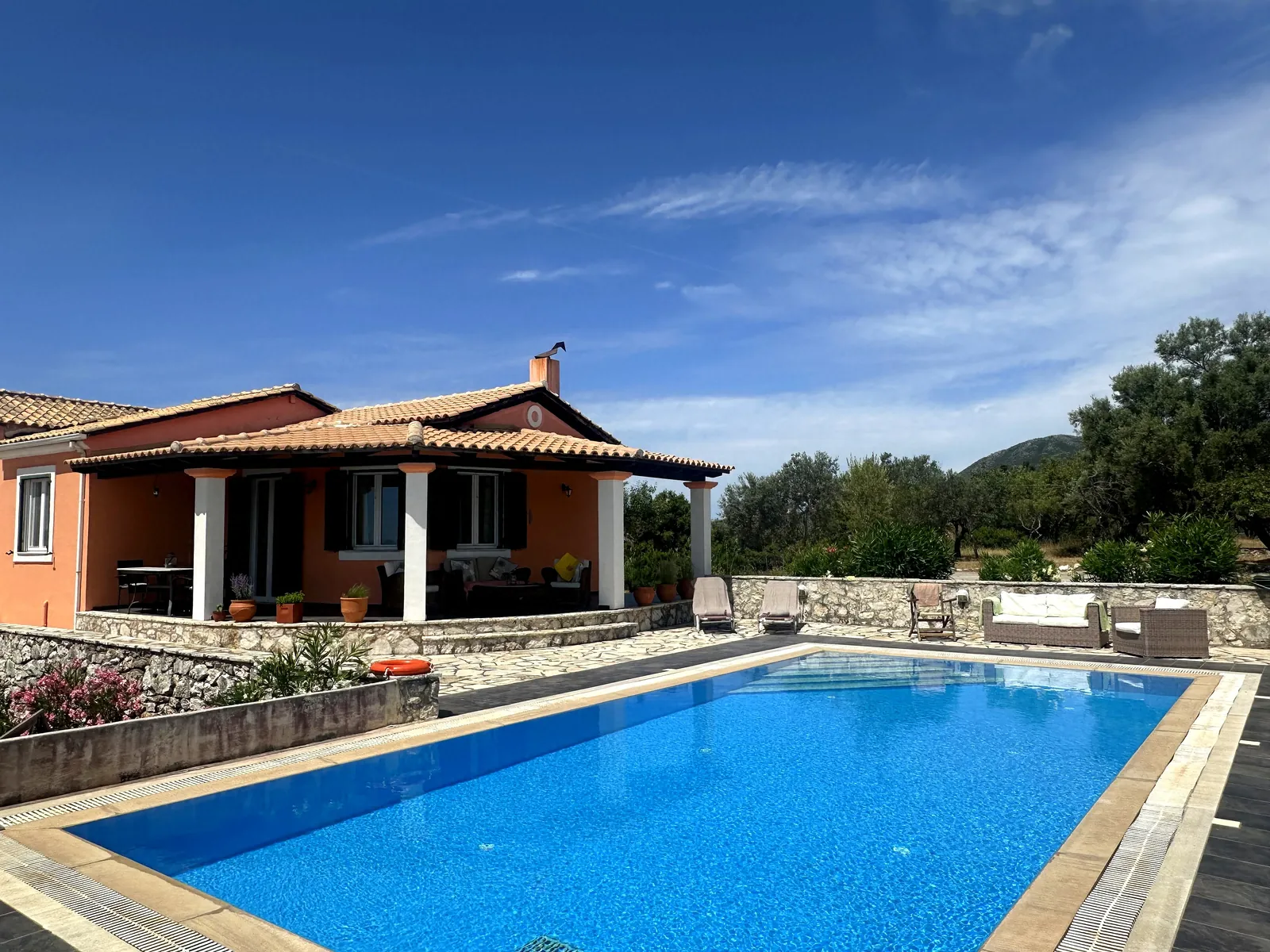 Villa Anatoli, Poros: the pool in front of the house, with the strait beyond
