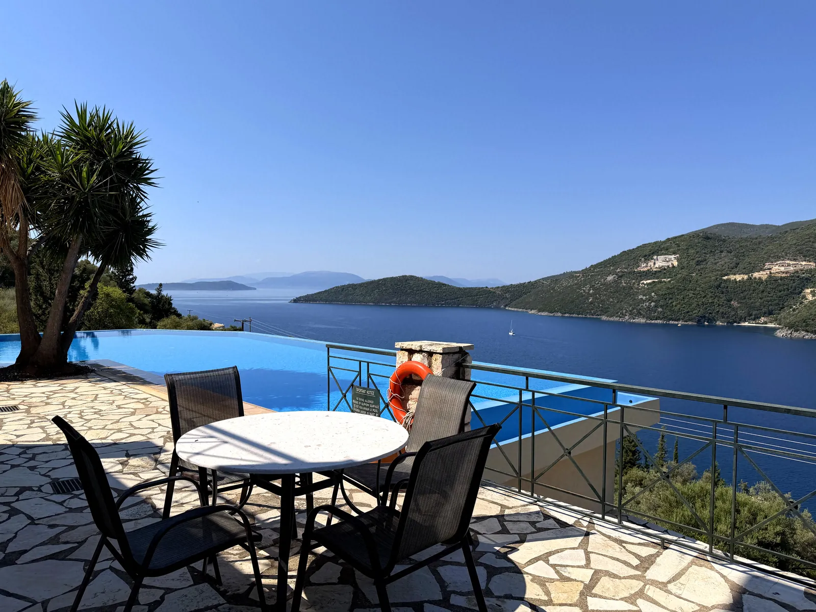 Table on the terrace by the infinity edge