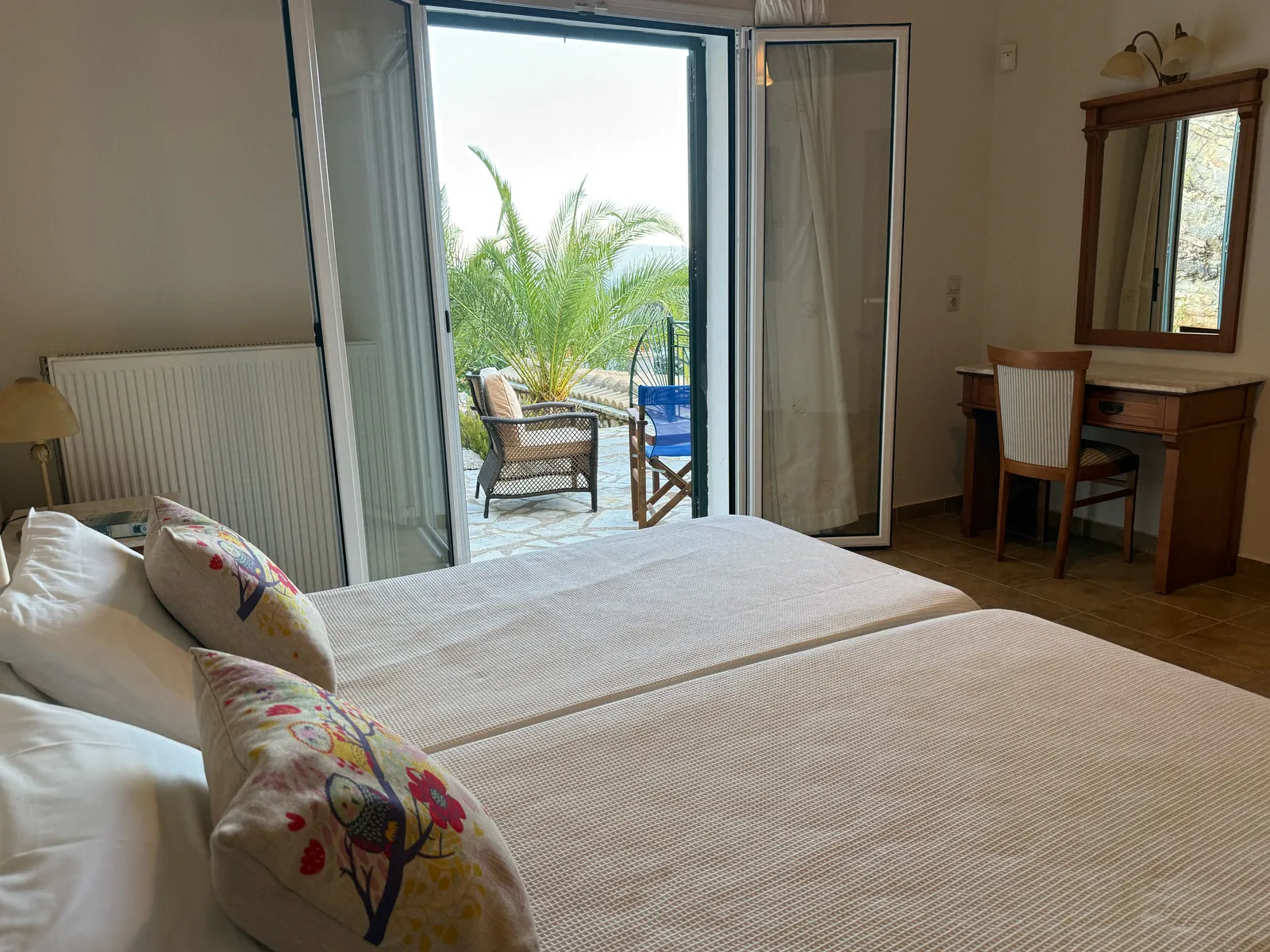 Bedroom 3, opening to the palm terrace
