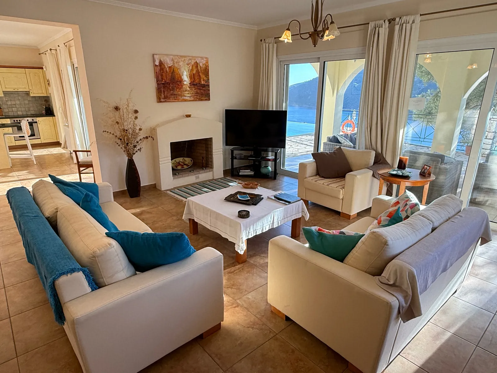 Living room with fireplace and glass doors