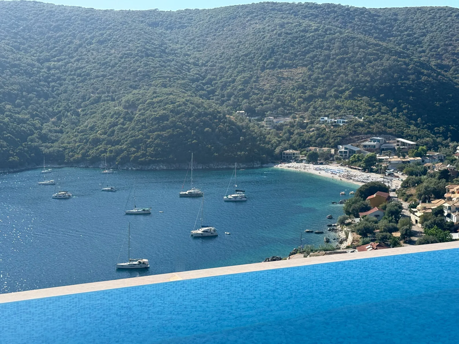 The infinity edge looking down to the village and the bay